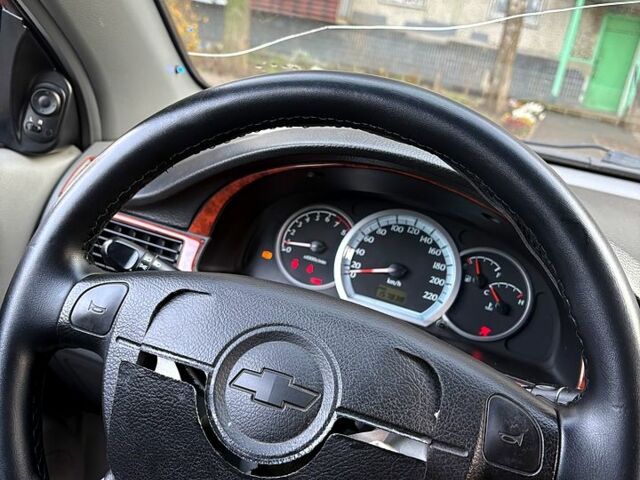 Червоний Шевроле Лачетті, об'ємом двигуна 1.6 л та пробігом 153 тис. км за 3500 $, фото 13 на Automoto.ua