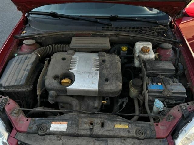 Красный Шевроле Лачетти, объемом двигателя 1.8 л и пробегом 171 тыс. км за 4400 $, фото 10 на Automoto.ua