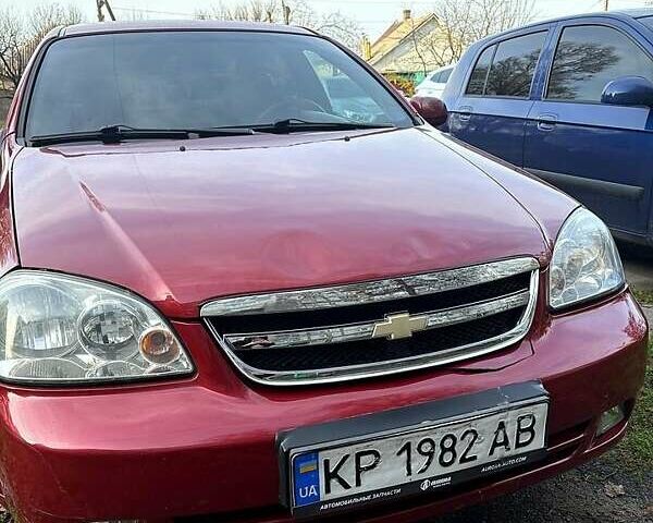 Красный Шевроле Лачетти, объемом двигателя 1.6 л и пробегом 153 тыс. км за 3500 $, фото 12 на Automoto.ua