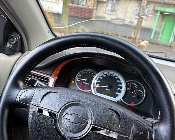 Красный Шевроле Лачетти, объемом двигателя 1.6 л и пробегом 153 тыс. км за 3500 $, фото 11 на Automoto.ua