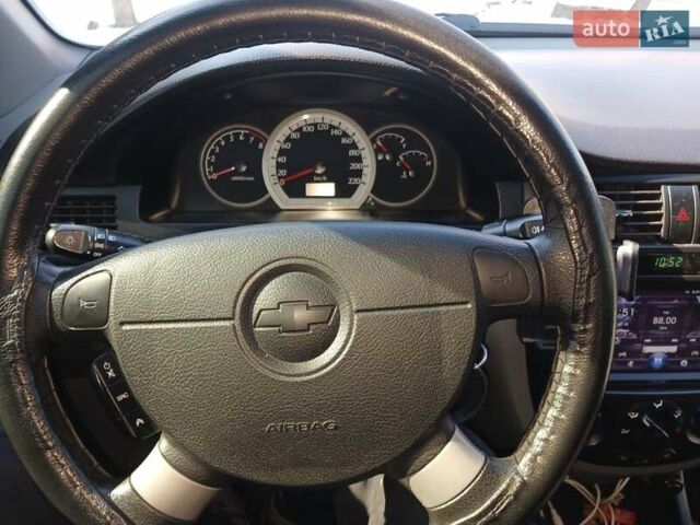 Червоний Шевроле Лачетті, об'ємом двигуна 1.6 л та пробігом 115 тис. км за 7000 $, фото 1 на Automoto.ua