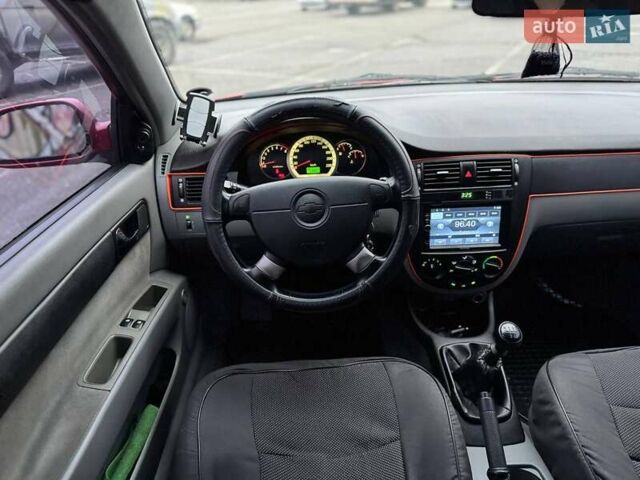 Красный Шевроле Лачетти, объемом двигателя 1.8 л и пробегом 158 тыс. км за 5690 $, фото 13 на Automoto.ua