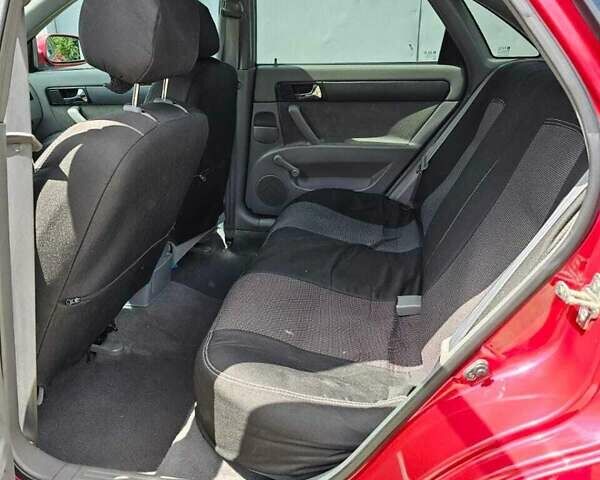 Красный Шевроле Лачетти, объемом двигателя 1.8 л и пробегом 148 тыс. км за 7000 $, фото 12 на Automoto.ua