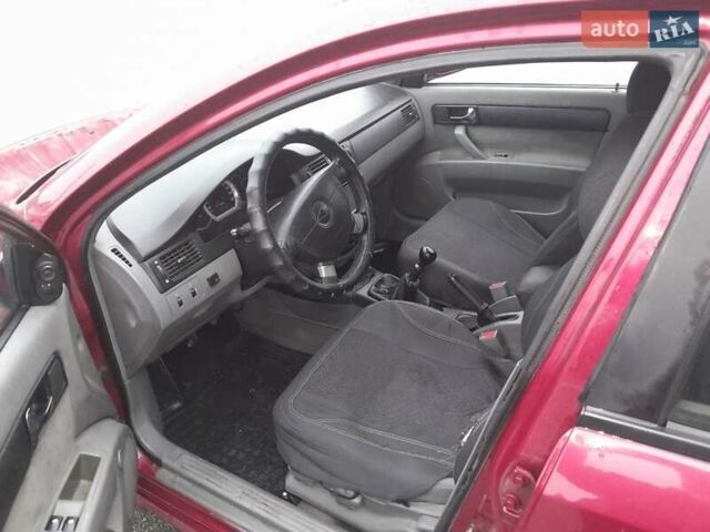 Красный Шевроле Лачетти, объемом двигателя 1.8 л и пробегом 338 тыс. км за 4300 $, фото 2 на Automoto.ua