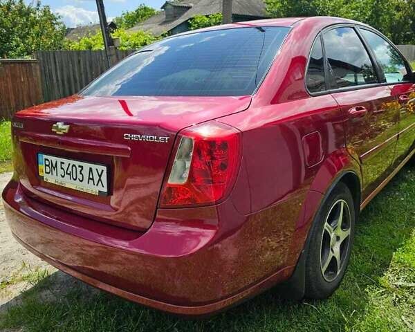 Красный Шевроле Лачетти, объемом двигателя 1.8 л и пробегом 148 тыс. км за 7000 $, фото 5 на Automoto.ua