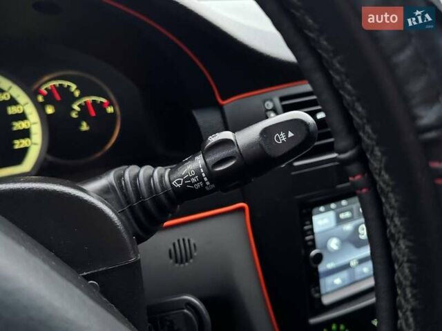 Красный Шевроле Лачетти, объемом двигателя 1.8 л и пробегом 158 тыс. км за 5690 $, фото 18 на Automoto.ua