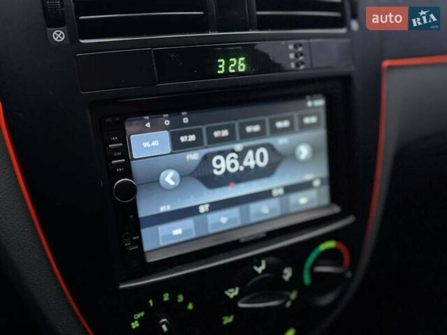 Красный Шевроле Лачетти, объемом двигателя 1.8 л и пробегом 158 тыс. км за 5390 $, фото 20 на Automoto.ua