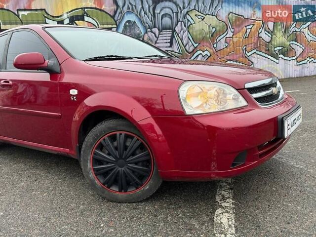 Красный Шевроле Лачетти, объемом двигателя 1.8 л и пробегом 158 тыс. км за 5690 $, фото 1 на Automoto.ua