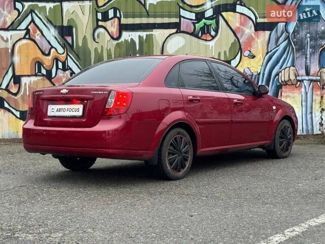 Красный Шевроле Лачетти, объемом двигателя 1.8 л и пробегом 158 тыс. км за 5690 $, фото 7 на Automoto.ua