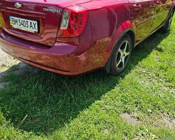 Красный Шевроле Лачетти, объемом двигателя 1.8 л и пробегом 148 тыс. км за 7000 $, фото 30 на Automoto.ua