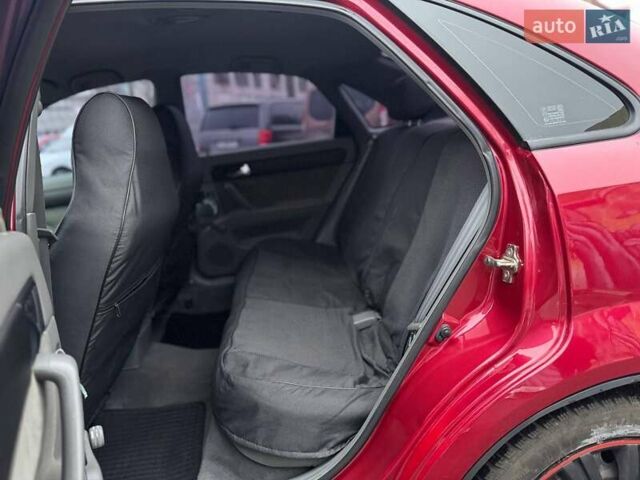 Красный Шевроле Лачетти, объемом двигателя 1.8 л и пробегом 158 тыс. км за 5390 $, фото 9 на Automoto.ua