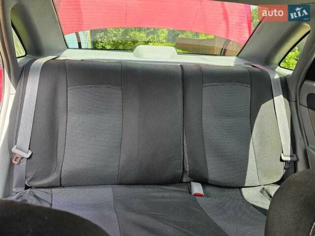 Красный Шевроле Лачетти, объемом двигателя 1.8 л и пробегом 148 тыс. км за 7000 $, фото 17 на Automoto.ua