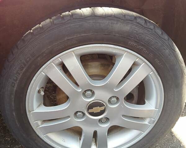 Червоний Шевроле Лачетті, об'ємом двигуна 1.6 л та пробігом 115 тис. км за 7000 $, фото 7 на Automoto.ua