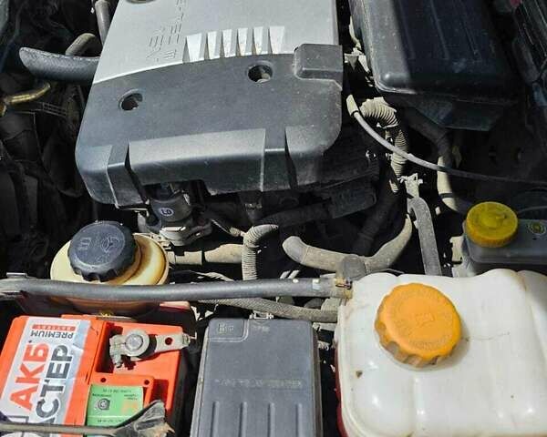 Красный Шевроле Лачетти, объемом двигателя 1.8 л и пробегом 148 тыс. км за 7000 $, фото 23 на Automoto.ua