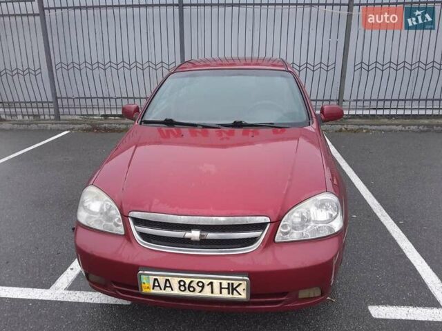 Красный Шевроле Лачетти, объемом двигателя 1.8 л и пробегом 338 тыс. км за 4300 $, фото 1 на Automoto.ua