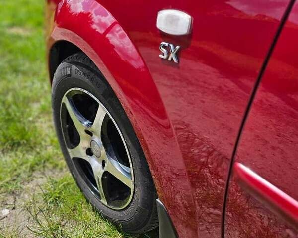 Красный Шевроле Лачетти, объемом двигателя 1.8 л и пробегом 148 тыс. км за 7000 $, фото 6 на Automoto.ua