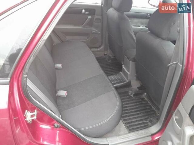 Красный Шевроле Лачетти, объемом двигателя 1.8 л и пробегом 338 тыс. км за 4300 $, фото 8 на Automoto.ua