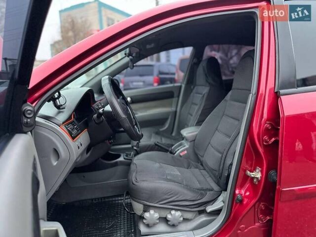 Красный Шевроле Лачетти, объемом двигателя 1.8 л и пробегом 158 тыс. км за 5690 $, фото 8 на Automoto.ua