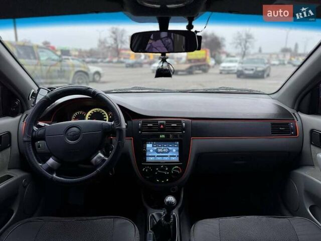 Красный Шевроле Лачетти, объемом двигателя 1.8 л и пробегом 158 тыс. км за 5690 $, фото 12 на Automoto.ua