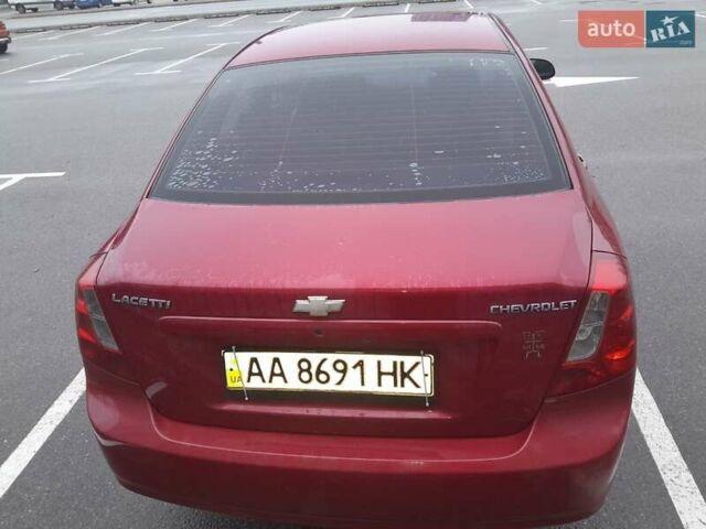 Красный Шевроле Лачетти, объемом двигателя 1.8 л и пробегом 338 тыс. км за 4300 $, фото 6 на Automoto.ua