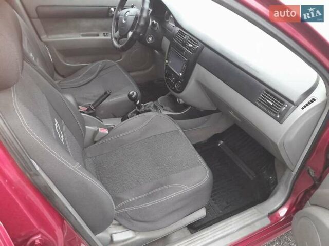 Красный Шевроле Лачетти, объемом двигателя 1.8 л и пробегом 338 тыс. км за 4300 $, фото 7 на Automoto.ua