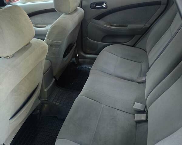 Красный Шевроле Лачетти, объемом двигателя 1.6 л и пробегом 220 тыс. км за 4300 $, фото 10 на Automoto.ua