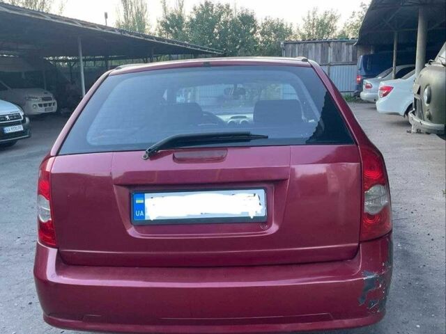 Красный Шевроле Лачетти, объемом двигателя 2.5 л и пробегом 270 тыс. км за 2450 $, фото 5 на Automoto.ua