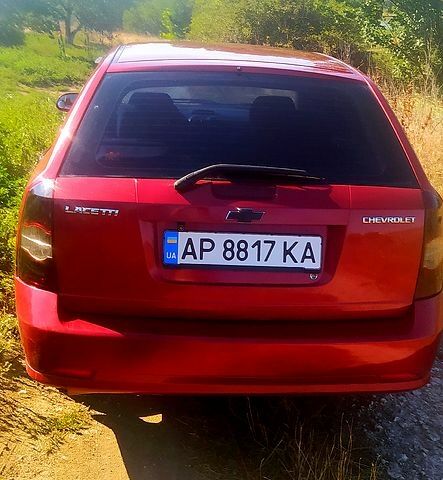 Красный Шевроле Лачетти, объемом двигателя 1.8 л и пробегом 271 тыс. км за 4250 $, фото 1 на Automoto.ua