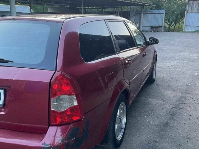 Красный Шевроле Лачетти, объемом двигателя 2.5 л и пробегом 270 тыс. км за 2450 $, фото 6 на Automoto.ua