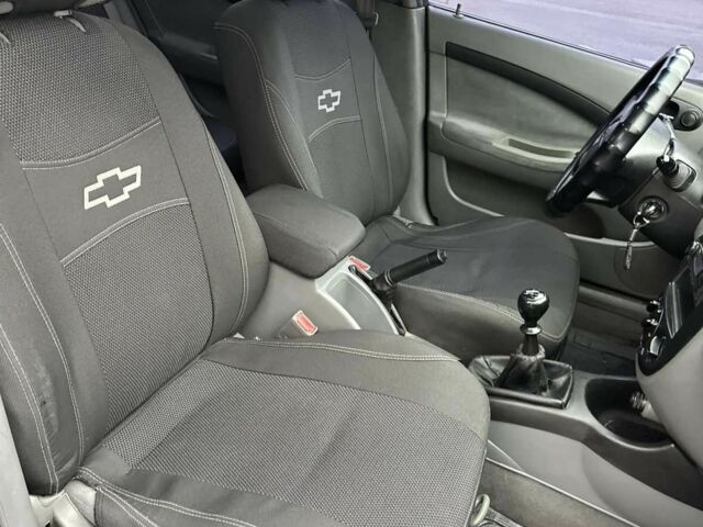 Красный Шевроле Лачетти, объемом двигателя 1.8 л и пробегом 251 тыс. км за 3999 $, фото 20 на Automoto.ua