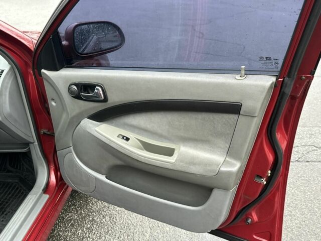 Красный Шевроле Лачетти, объемом двигателя 1.8 л и пробегом 251 тыс. км за 3999 $, фото 17 на Automoto.ua