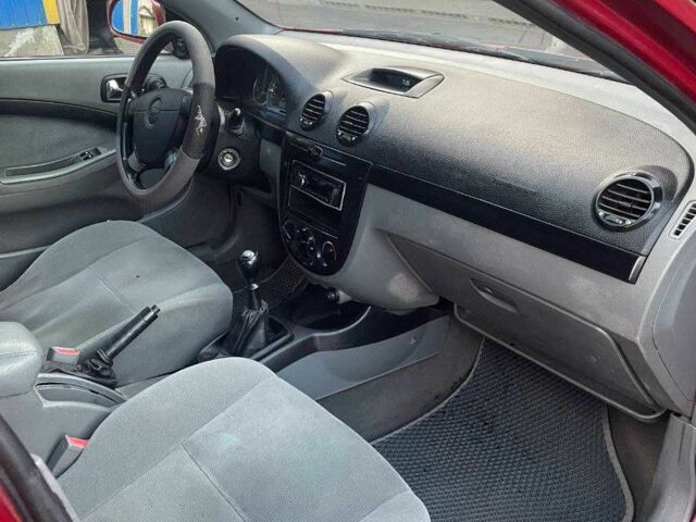 Красный Шевроле Лачетти, объемом двигателя 2.5 л и пробегом 270 тыс. км за 2450 $, фото 1 на Automoto.ua