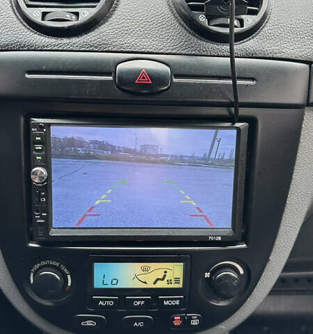 Червоний Шевроле Лачетті, об'ємом двигуна 1.8 л та пробігом 280 тис. км за 5850 $, фото 13 на Automoto.ua