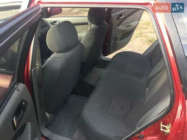 Червоний Шевроле Лачетті, об'ємом двигуна 1.8 л та пробігом 184 тис. км за 4300 $, фото 5 на Automoto.ua