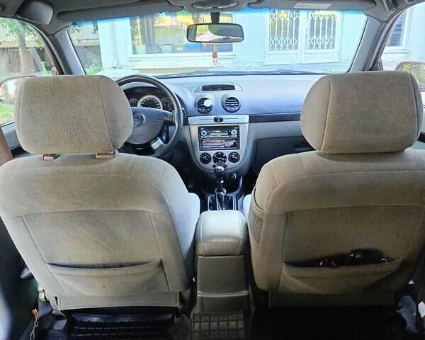 Красный Шевроле Лачетти, объемом двигателя 1.6 л и пробегом 220 тыс. км за 4300 $, фото 14 на Automoto.ua