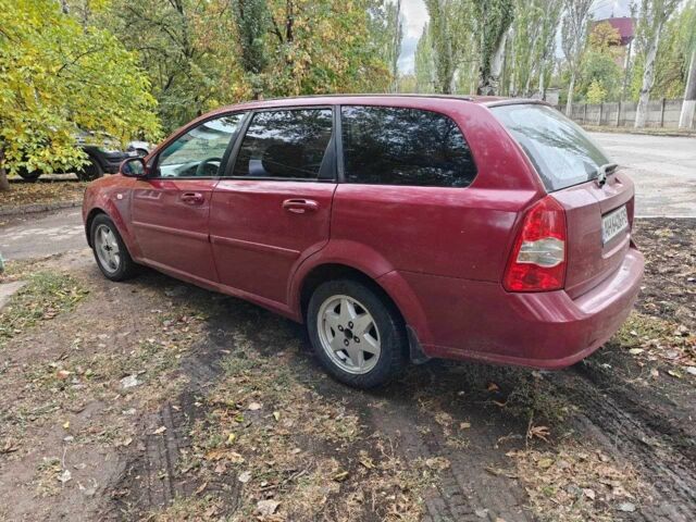 Красный Шевроле Лачетти, объемом двигателя 2.5 л и пробегом 270 тыс. км за 2450 $, фото 7 на Automoto.ua