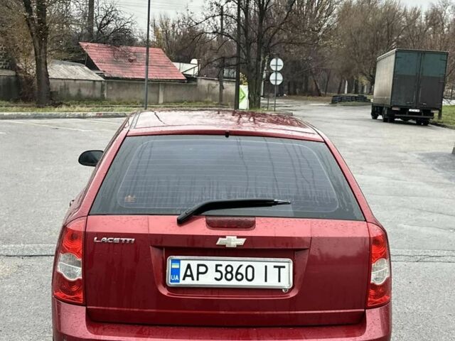 Красный Шевроле Лачетти, объемом двигателя 1.8 л и пробегом 251 тыс. км за 3999 $, фото 9 на Automoto.ua