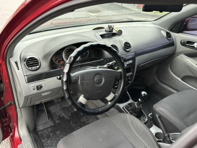 Красный Шевроле Лачетти, объемом двигателя 1.8 л и пробегом 251 тыс. км за 3999 $, фото 21 на Automoto.ua