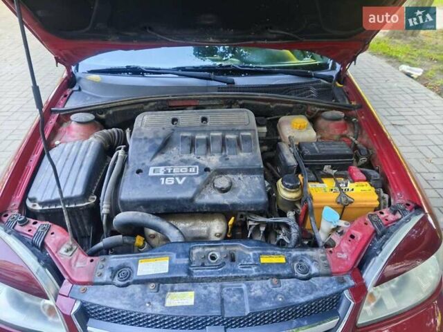 Красный Шевроле Лачетти, объемом двигателя 1.6 л и пробегом 220 тыс. км за 4300 $, фото 21 на Automoto.ua