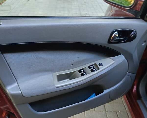 Красный Шевроле Лачетти, объемом двигателя 1.6 л и пробегом 220 тыс. км за 4300 $, фото 24 на Automoto.ua