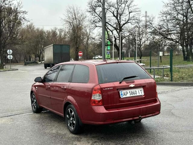 Красный Шевроле Лачетти, объемом двигателя 1.8 л и пробегом 251 тыс. км за 3999 $, фото 12 на Automoto.ua
