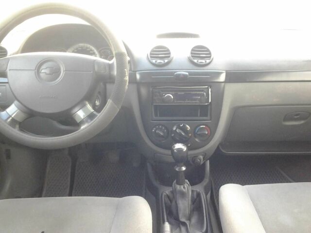 Червоний Шевроле Лачетті, об'ємом двигуна 1.8 л та пробігом 300 тис. км за 3602 $, фото 11 на Automoto.ua