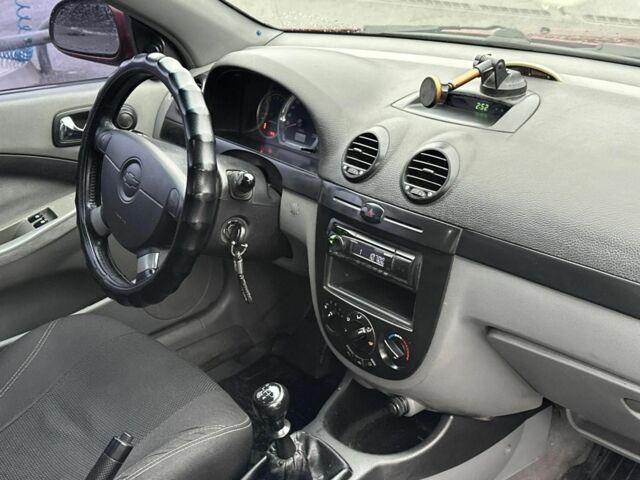 Красный Шевроле Лачетти, объемом двигателя 1.8 л и пробегом 251 тыс. км за 3999 $, фото 19 на Automoto.ua