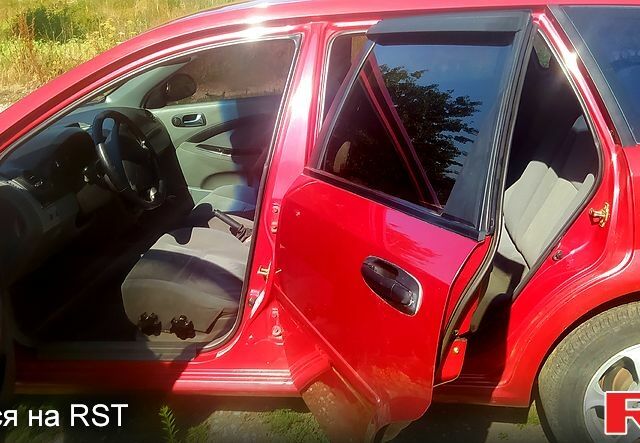 Красный Шевроле Лачетти, объемом двигателя 1.8 л и пробегом 271 тыс. км за 4250 $, фото 2 на Automoto.ua