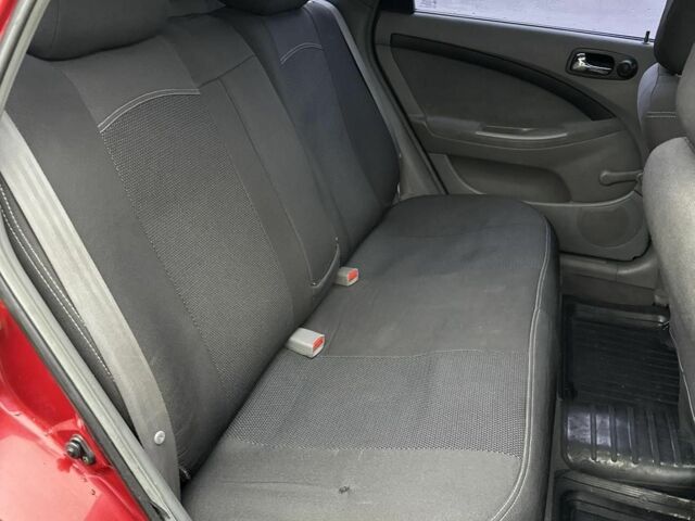 Красный Шевроле Лачетти, объемом двигателя 1.8 л и пробегом 251 тыс. км за 3999 $, фото 22 на Automoto.ua