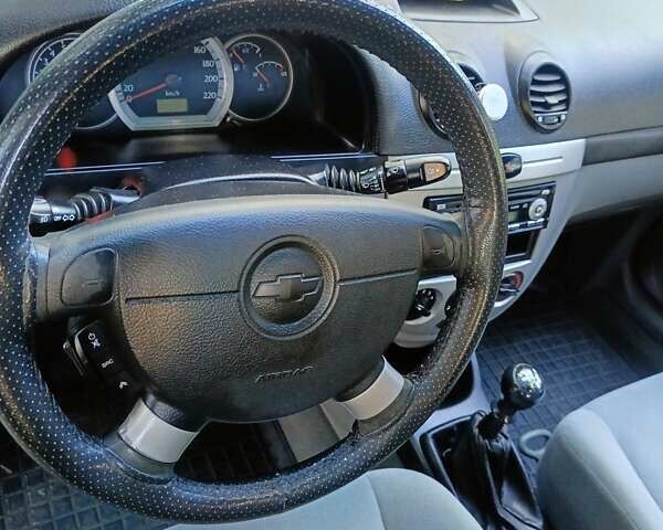 Красный Шевроле Лачетти, объемом двигателя 1.6 л и пробегом 220 тыс. км за 4300 $, фото 13 на Automoto.ua