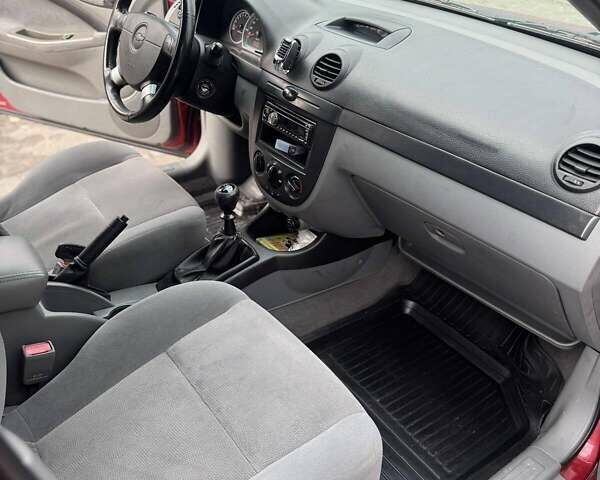 Червоний Шевроле Лачетті, об'ємом двигуна 1.8 л та пробігом 264 тис. км за 4500 $, фото 12 на Automoto.ua