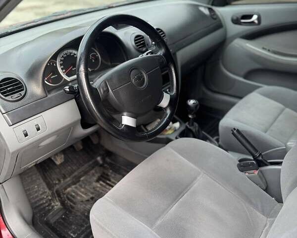 Червоний Шевроле Лачетті, об'ємом двигуна 1.8 л та пробігом 264 тис. км за 4500 $, фото 11 на Automoto.ua