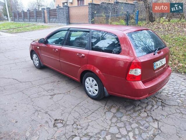 Красный Шевроле Лачетти, объемом двигателя 1.8 л и пробегом 380 тыс. км за 2999 $, фото 3 на Automoto.ua