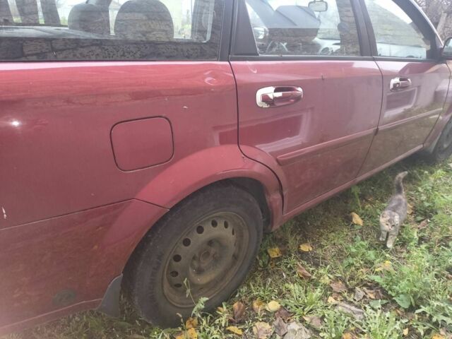 Красный Шевроле Лачетти, объемом двигателя 1 л и пробегом 5 тыс. км за 2489 $, фото 2 на Automoto.ua